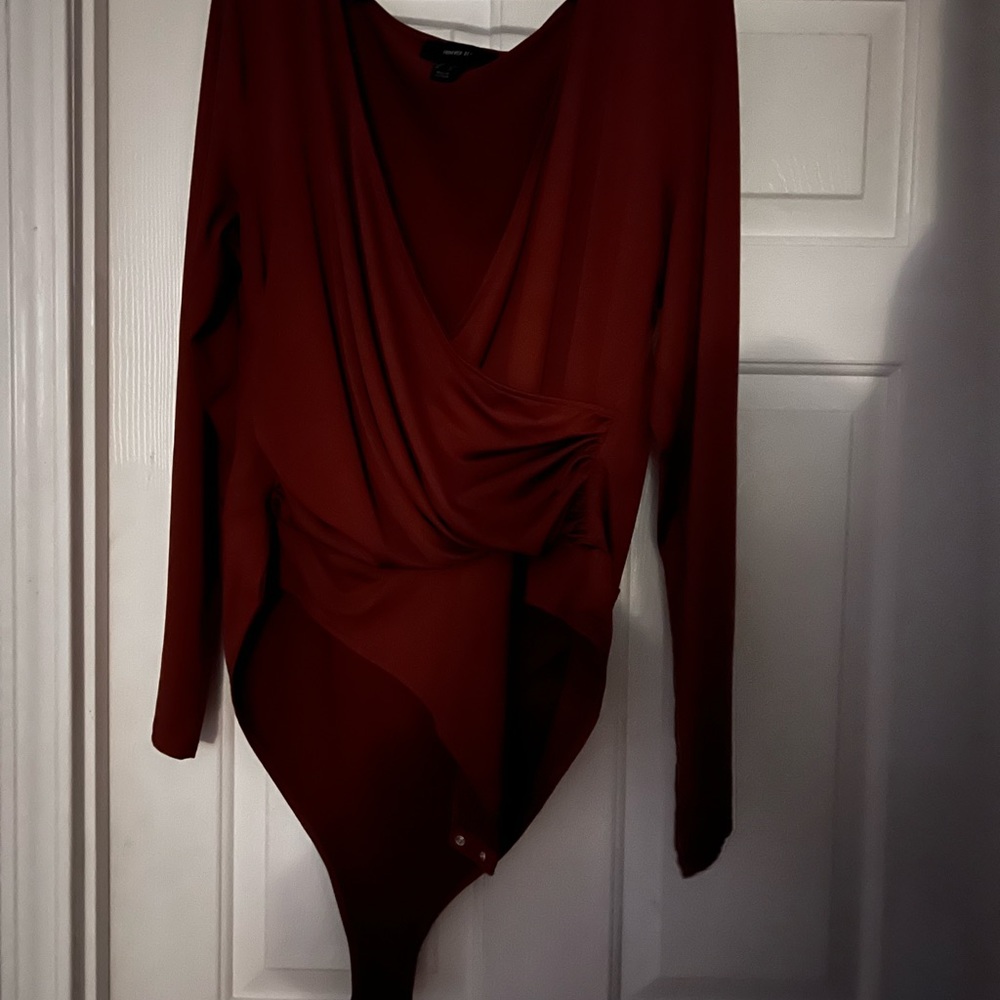 Burnt orange body suit